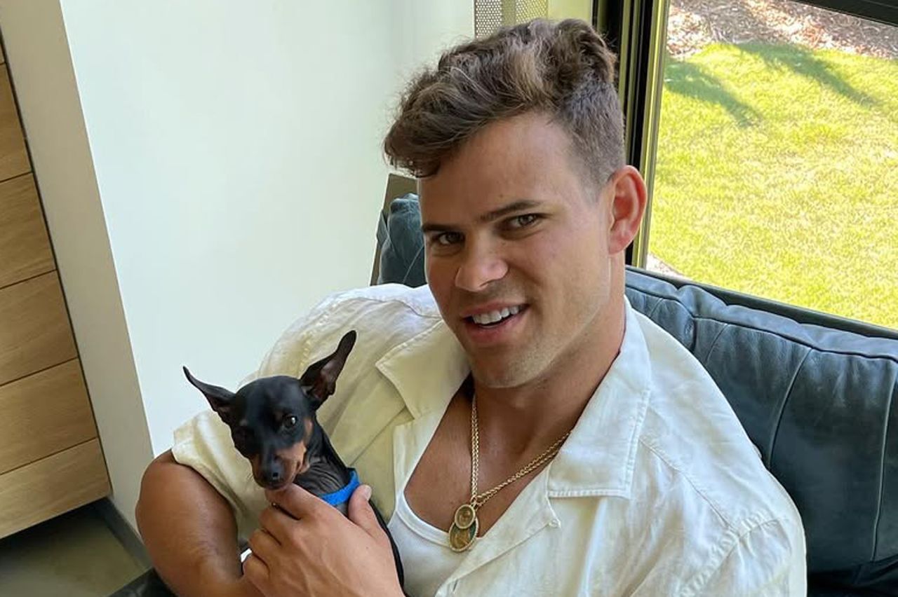 Kris Humphries posing with his dog in 2022.Credit: Kris Humphries/Instagram