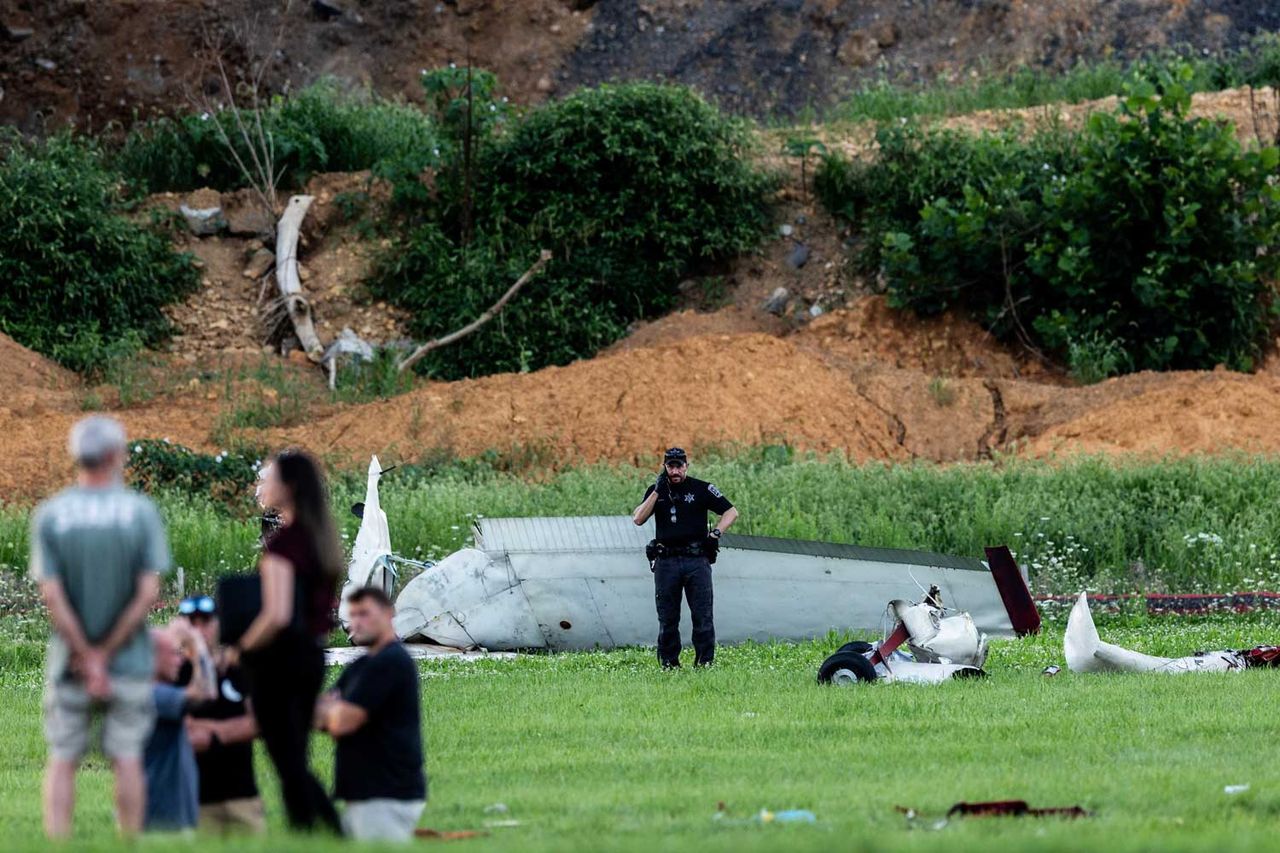 Authorities investigate a crash between a Pennsylvania State Police helicopter and a small plane at the Carlisle airport in Carlisle, Pa. Wednesday, Aug. 19, 2026 Photo of crash sceneCredit: Sean Simmers/The Patriot-News via AP