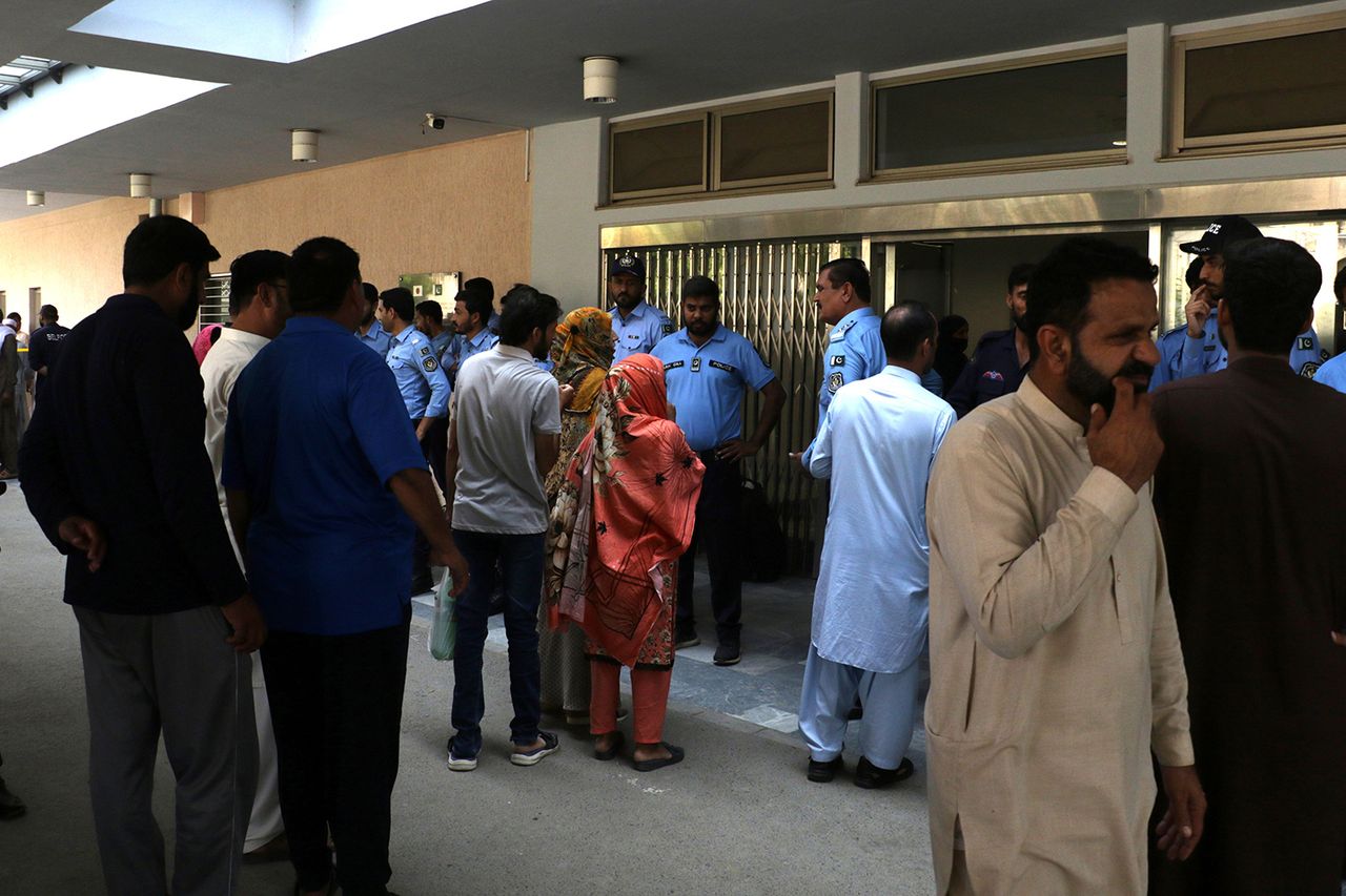 Relatives outside the Pakistan Institute of Medical Science in Islamabad on Aug. 26, 2026Credit: SOHAIL SHAHZAD/EPA/Shutterstock