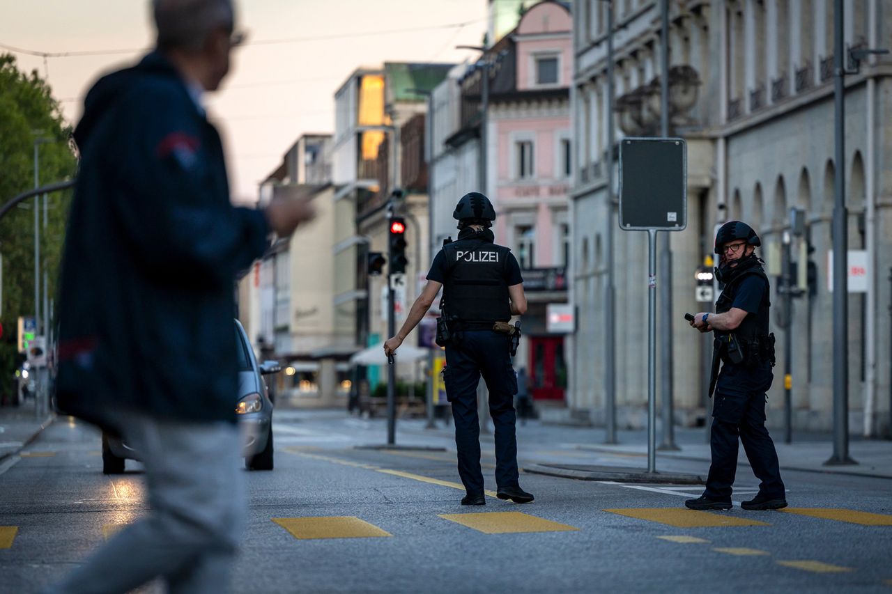 Police officers patrol a street in downtown Aarau, Switzerland, on Aug. 30Credit: Michael Buholzer/Keystone via AP