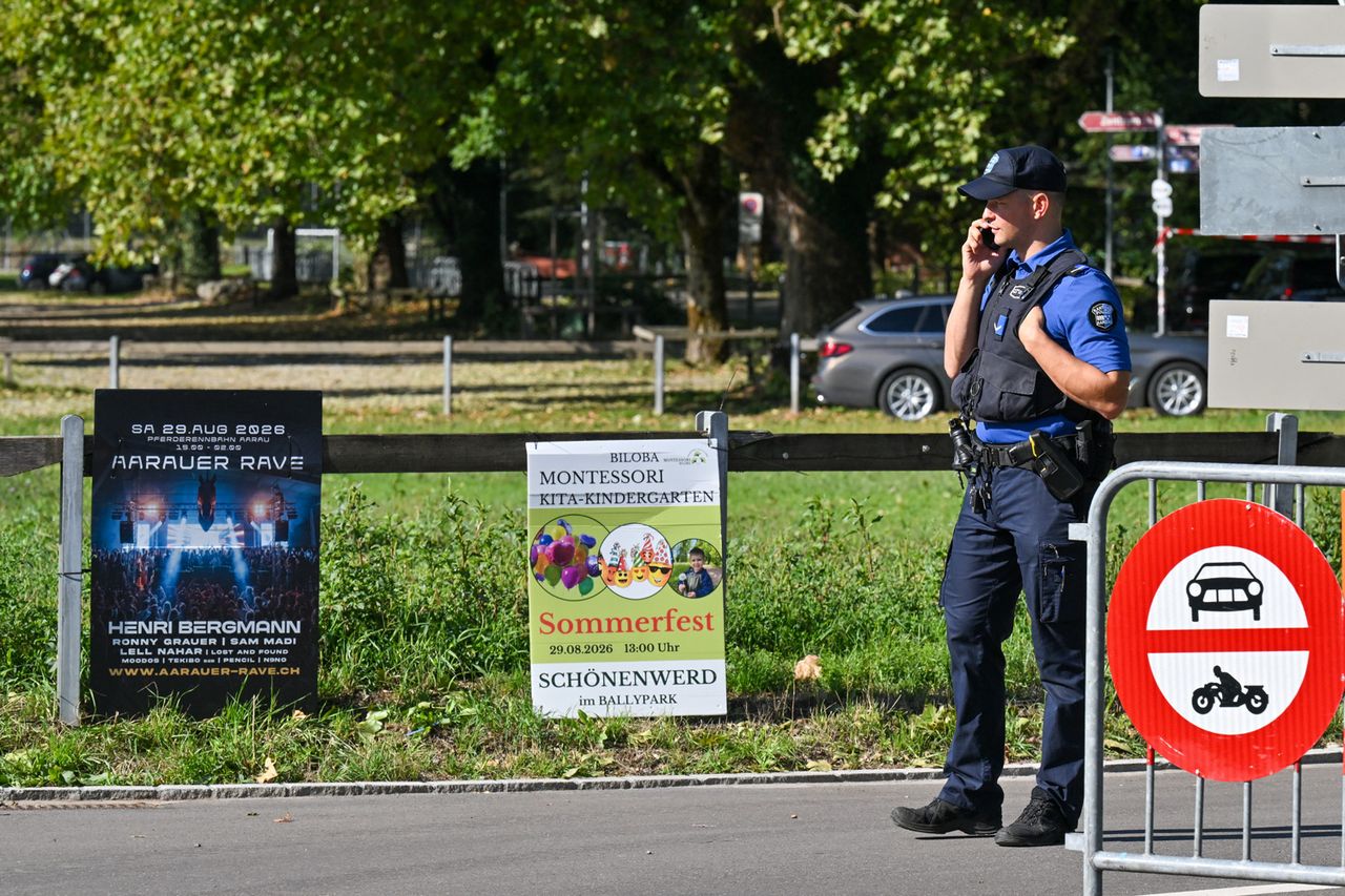 Police officers secure the area where a shooting occurred, in Aarau, Switzerland, on Aug. 30Credit: Harold CUNNINGHAM / AFP via Getty