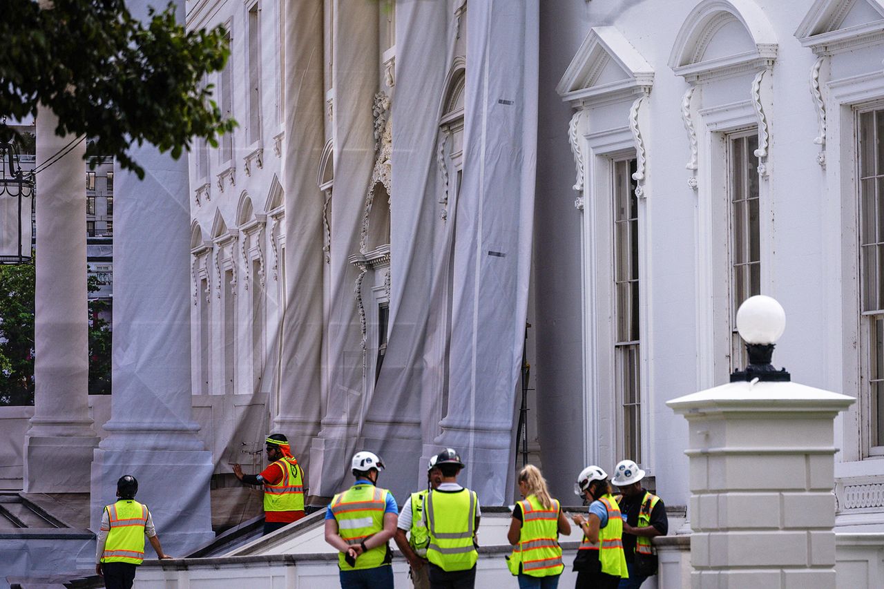 Workers use a tarp to cover scaffolding on the North Portico of the White House in Washington, DC, US, on Thursday, July 9, 2026Credit: Tierney L. Cross/The Washington Post/Bloomberg via Getty