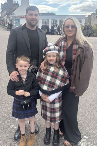 Kenzie Macrae with his familyCredit: Kennedy News and Media