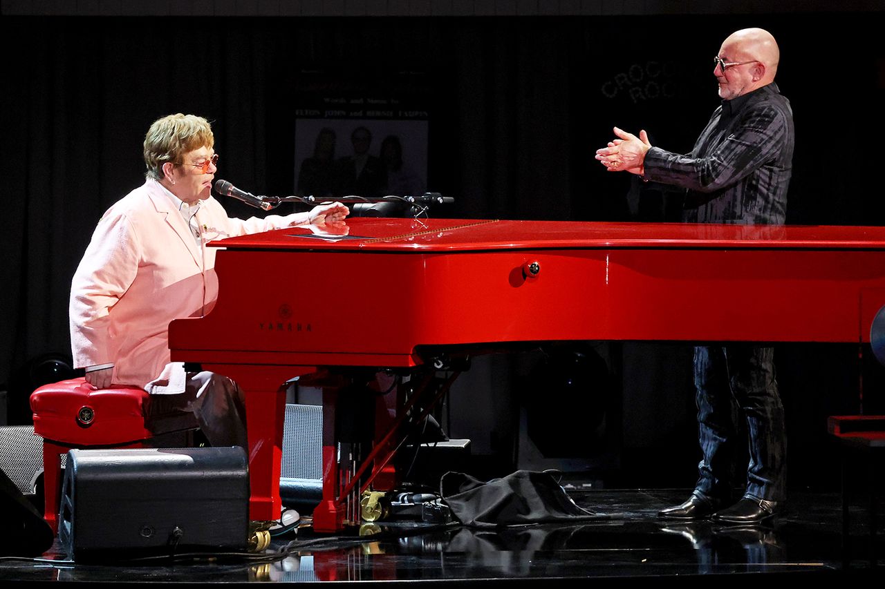 Honorees Elton John and Bernie Taupin speak onstage during the Library Of Congress 2024 Gershwin Prize For Popular Song at DAR Constitution Hall on March 20, 2024 in Washington, DC. Elton John and Bernie Taupin in Washington, DC in March 2024Credit: Kevin Mazur/Getty