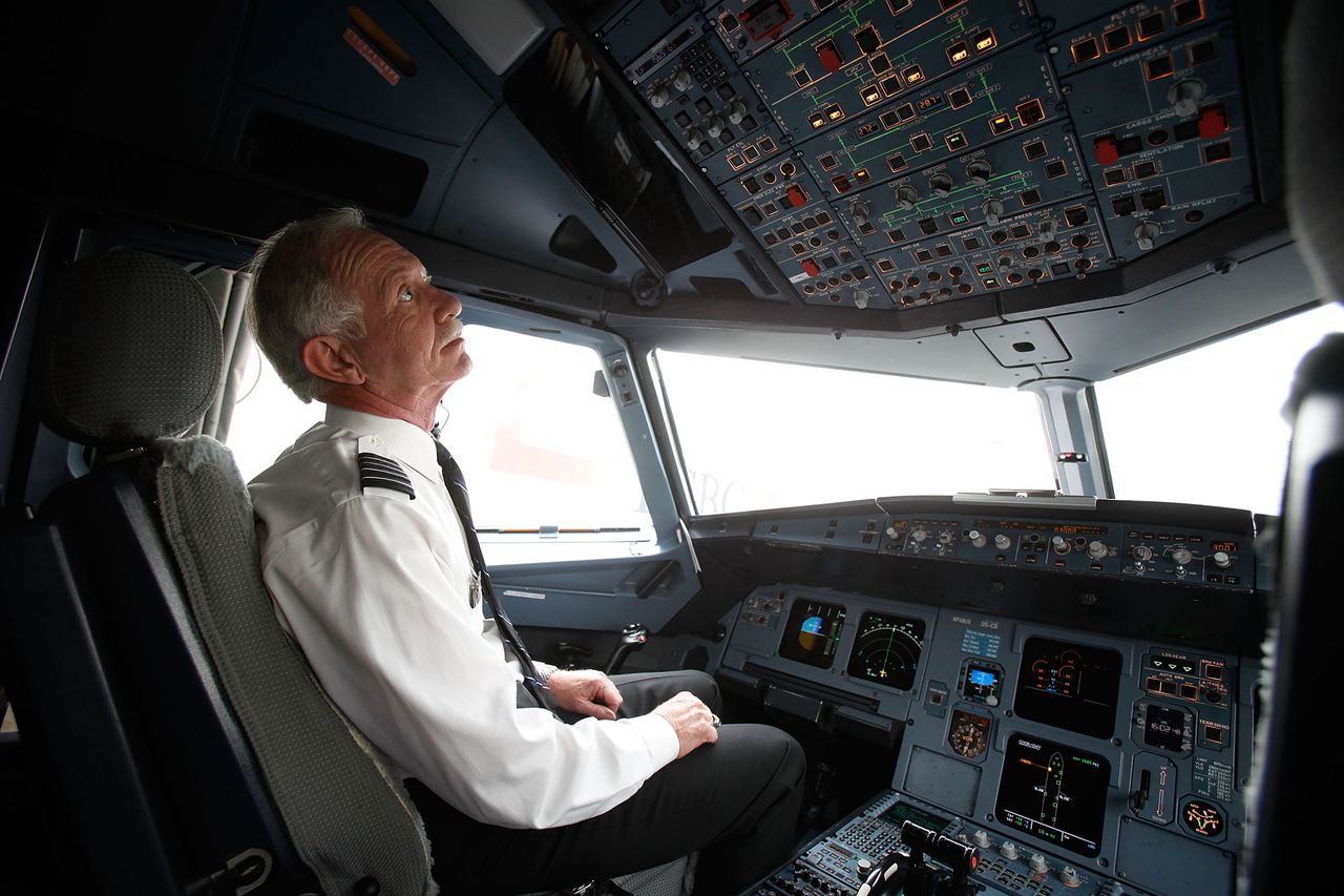 Captain Chesley “Sully” Sullenberger sits in the cockpit of a US Airways flight moments before take-off from LaGuardia Airport on his first official day back in the cockpit on October 1, 2009 in New York, New YorkCredit: Seth Wenig-Pool/Getty