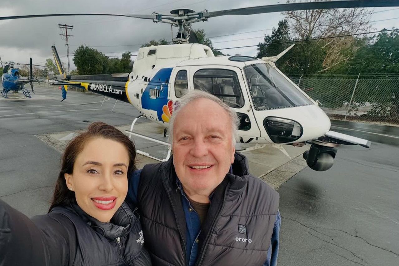 Two individuals a man and a woman posing in front of a helicopter Eliana Moreno (left) and George Marciniw (right)Credit: George Marciniw/Facebook