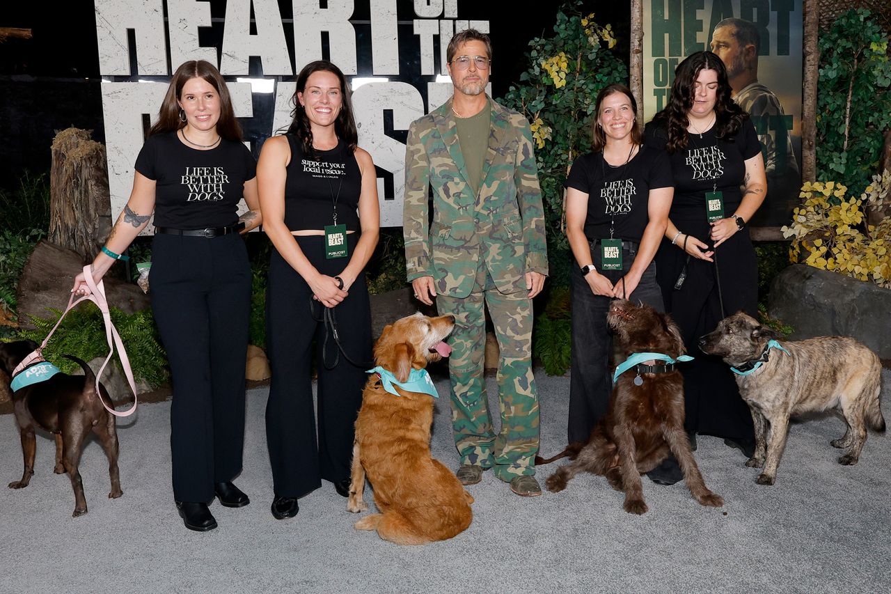 Brad Pitt (C) attends Paramount Pictures’ “Heart Of The Beast” Global Premiere at FirstBank Amphitheater on September 16, 2026, in Franklin, Tenn., with dogs from Wags & Walks.Credit: Jason Kempin/Getty
