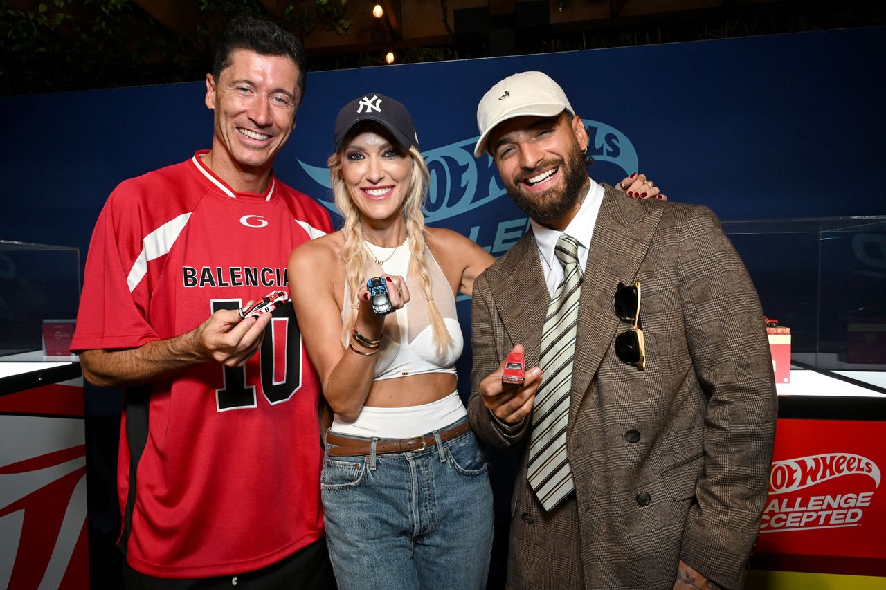 Robert Lewandowski, Alex Hirschi, aka Supercar Blondie and MalumaCredit: Michael Kovac/Getty