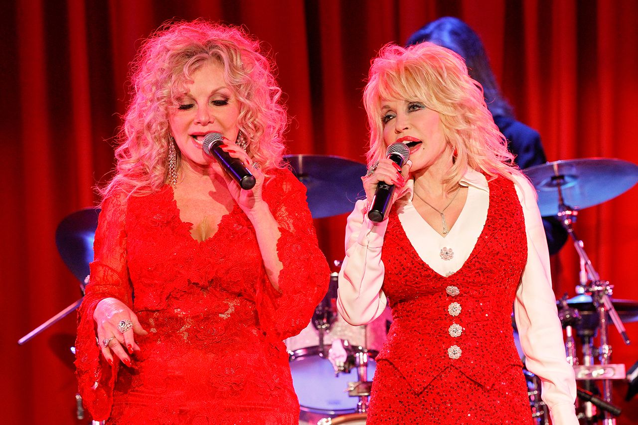 Stella Parton and Dolly Parton attend Stella Parton’s Red Tent Women’s Conference 2014 at the Doubletree Hotel Downtown on April 18, 2014Credit: Photo by Terry Wyatt/Getty