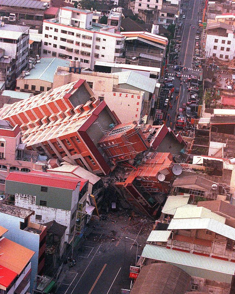 An aerial view of Tungshih, in the central county of Taichung, shows a toppled building after Taiwan was hit by its strongest earthquake this century 21 September, 1999. An aerial view of Tungshih, in Taichung, Taiwan, after the earthquake of 1999Credit: CHEN KUNG-KU/AFP via Getty