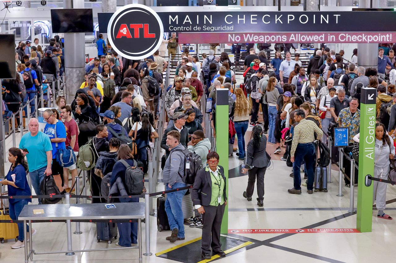 Air passengers wait in long TSA security screening checkpoint lines at Hartsfield-Jackson Atlanta International Airport in Atlanta, Georgia on March 23, 2026.Credit: ERIK S LESSER/EPA/Shutterstock