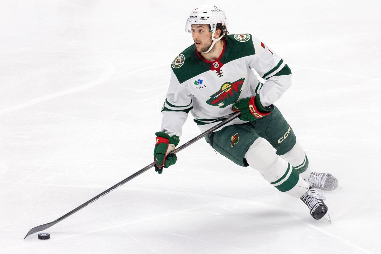 Brock Faber #7 of the Minnesota Wild skates with the puck during the overtime period of Round Two Game Five of the Stanley Cup Playoffs against the Colorado Avalanche at Ball Arena on May 13, 2026 in Denver, Colorado. Brock Faber on May 13, 2026 in Denver, ColoradoCredit: Ashley Potts/NHLI via Getty