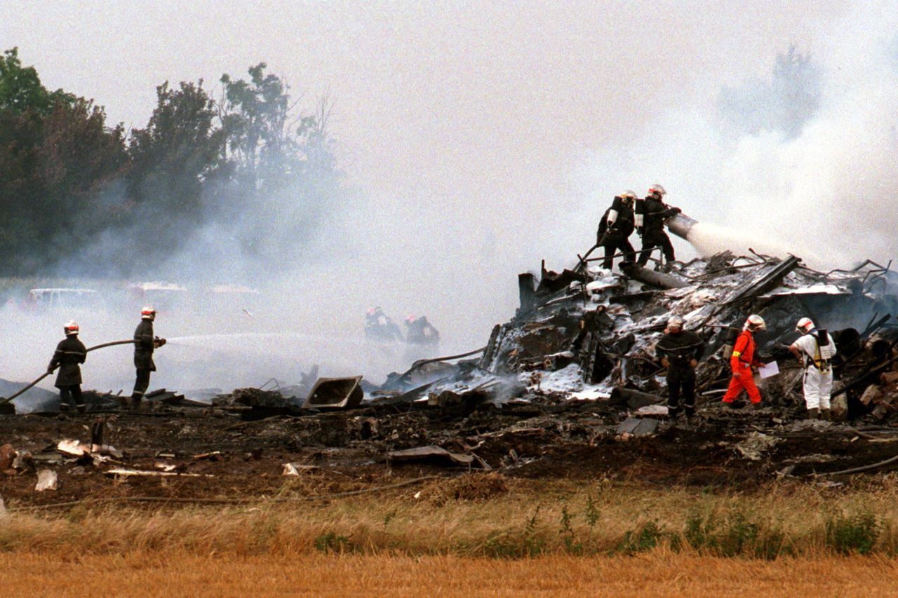 Firefighters put out the last flames surrounding the wreckage of the Air France Concorde that crashed shortly after takeoff July 25, 2000 outside Paris. Aftermath of the Concorde crash in 2000Credit: Ami Vitale/Liaison