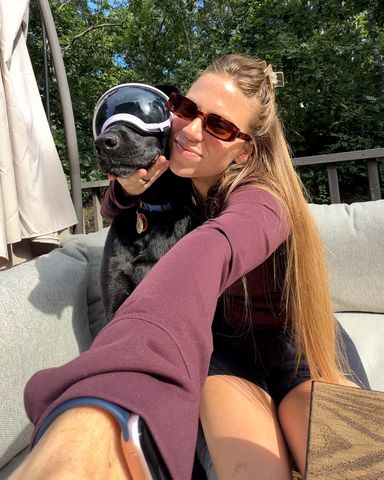 Kaitlyn Ballard with a dog.Credit: Kaitlyn Ballard