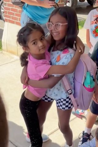 Hoda Kotb’s daughters hug on first day of school.Credit: Hoda Kotb/Instagram