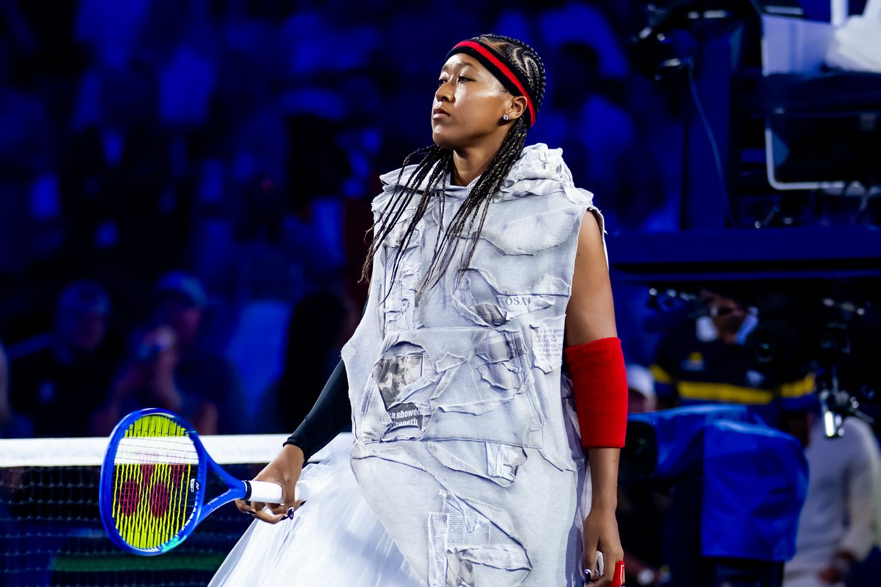 Naomi Osaka holding a tennis racket on a tennis court Naomi Osaka at the U.S Open on Aug. 31, styled by Law Roach.Credit: Robert Prange/Getty