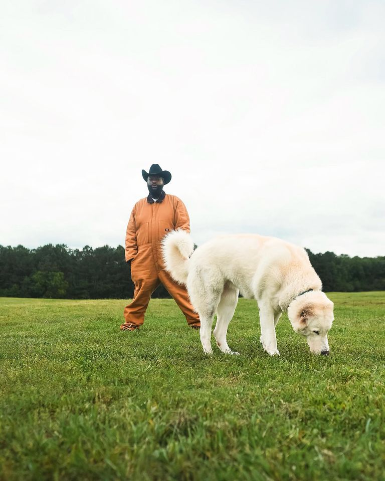 Rick Ross and his dog on his farm.Credit: Rick Ross/Instagram