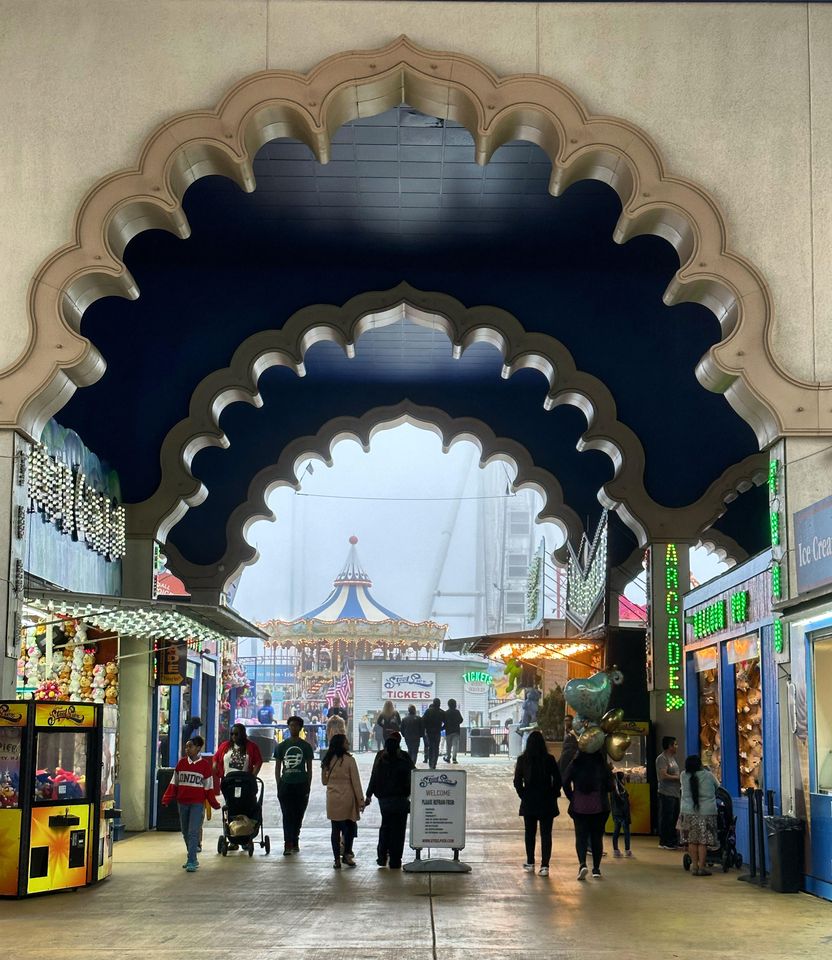 Guests walk through an archway at Steel Pier in Atlantic City, N.J.Credit: sep120 / Stockimo / Alamy Stock Photo