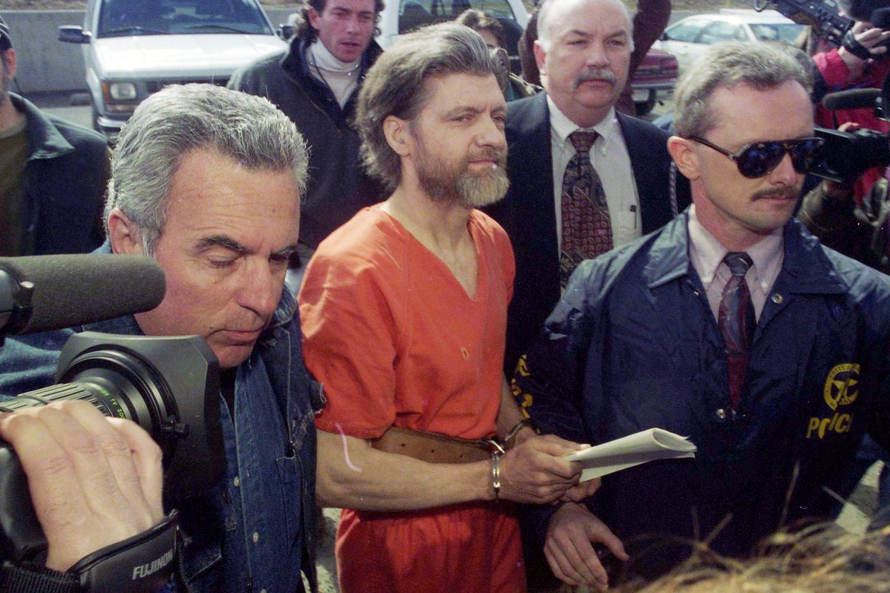 Theodore ‘Ted’ Kaczynski is arraigned by federal marshals on April 4, 1996 in Helena, Mont.Credit: Michael Macor/The San Francisco Chronicle via Getty
