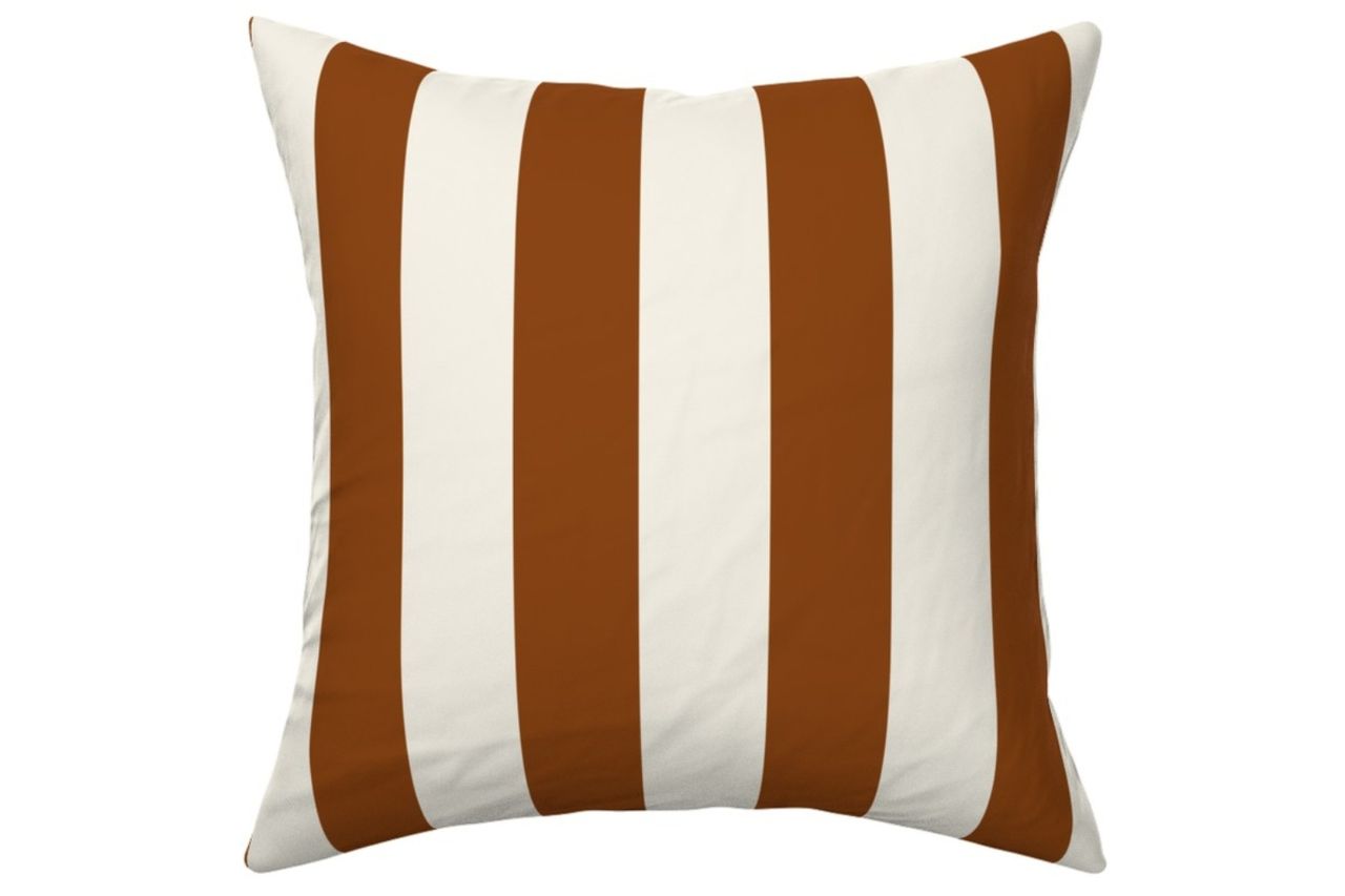 Throw Pillow in '70s Garden Party Brown and Cream Stripes Credit: Spoonflower