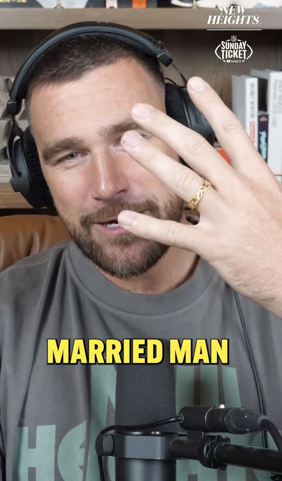 Travis Kelce shows off his wedding ring on his ‘New Heights’ podcastCredit: New Heights/YouTube
